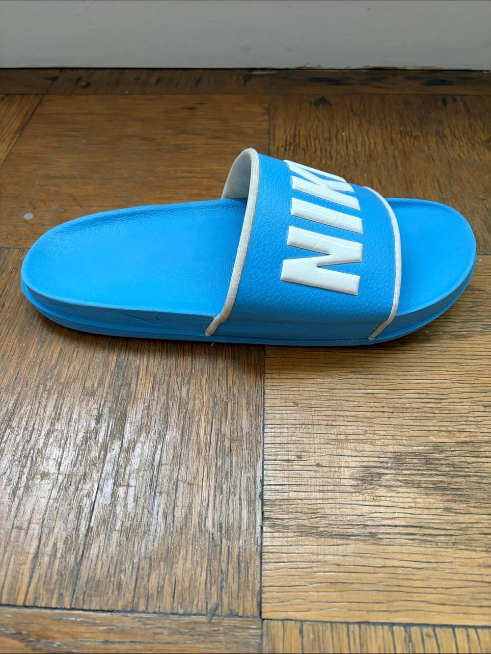 Nike Men’s Light Blue Slide Sandals with White NIKE Logo